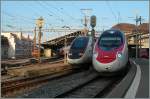 Verschiende  Gesichter  verschiedene Destinationen: TGV nach Paris und SBB RABe 503 nach Venezia S.L.