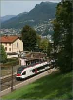 Bei der kleinen Haltestelle Lugano Paradiso hält gerade in TILO-Flirt RABe 524.