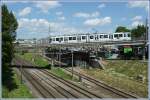 Auch (fast) ein Bem 550: ein Triebwagen der TL (m1) berquert die berlastete SBB Strecke Lausanne - Renens - Genve/Yverdon am 5.