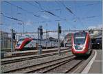 Die SBB Twindexx Züge dominieren vermehrt das Bild: IC 1 nach Genève und IR 15 nach Palézieux.