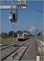 Der SBB RABe 522 211 verlässt Delle in Richtung Meroux TGV.