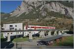 Ein TMR Region Alpes NINA RABe 525 überquert bei Sembrenche von Le Châble kommend den Sembrancher Viadukt.