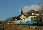 Der MOB ABDe 8/8 4001 mit eine Regionalzug von Zweisimmen nach Montreux bei Les Panches .