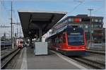 Der asm Be 4/8 111  Jupiter  wartet in Langenthal auf die Abfahrt nach Solothurn. 
Im Hintergrund wird der Be 4/4 114 mit Bt (1)12 (ex FW) als Regionalzug nach St.Urban bereitgestellt.

10. August. 2020