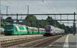BAM Ge 4/4 21 mit Leermateial des Regionalzugs 105 und SBB RABDe 511 nach Romont in Morges. 
7. Juli 2014