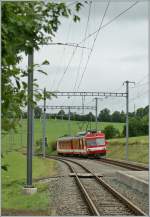 Ein CJ Regionalzug nach La Chaux-de-Fonds erreicht La Cibourg am 19. August 2010.