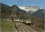 Dei MOB GDe 4/4  Schokoladenzug Lok  mit dem Regionalzug 2225 von Zweisimmen nach Montreux bei der Einfahrt in Sendy-Sollard am 21. Mrz 2012
