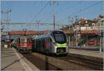 Die SBB Re 6/6 11635 (Re 620 035-6)   Muttenz  und der BLS MIKA RABe 528 215 als IR nach La Chaux de Fonds sorgen an diesem Sommermorgen in Neuch�tel f�r ein buntes Bahnbild. 

16. Juli 2026 