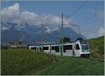 In den Weinreben und von diesen etwas verdeckt fährt der neue TPC ASD ABe 4/8 473  Glacier 3000  oberhalb von Aigle in Richtung Les Diablerets.

3. Aug. 2024