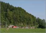 HGe 4/4 mit einem IR von Luzern nach Interlaken bei der Dienststation  Kppeli . 
20. Aug. 2012