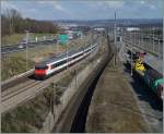 Ein IR vn Luzern nach Genèe in der interessanten Verkehrslandschaft bei Lonay. 
05. März 2014